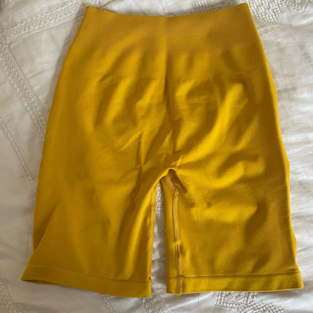 Alphalete yellow biker shorts, never worn, size small